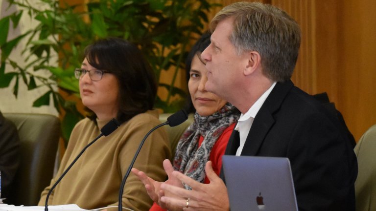 Scholars during a panel discussion