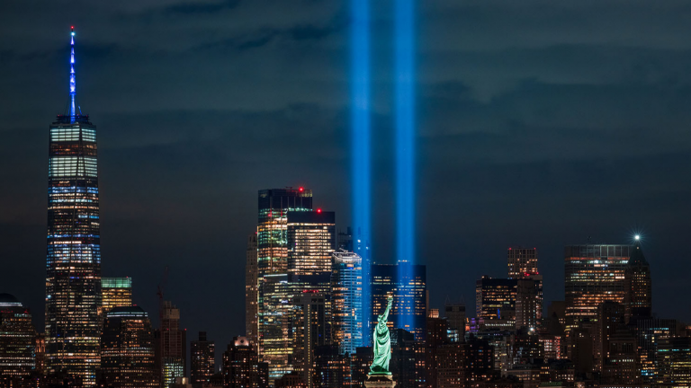 Pillars of light are projected from the 9/11 Memorial Site where the Twin Towers used to stand in New York CIty.