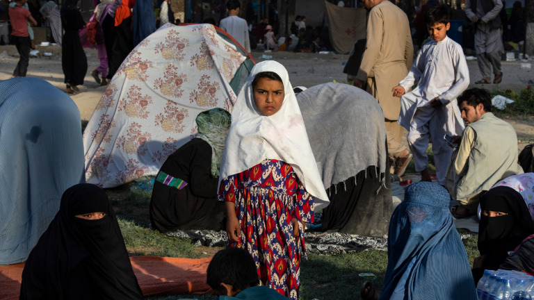 Displaced Afghans are seen at a makeshift IDP camp in Kabul.