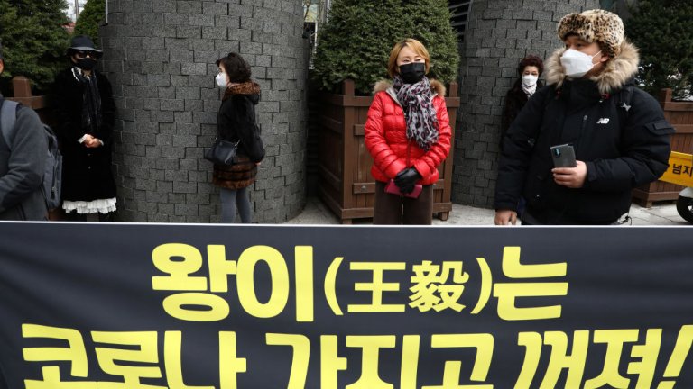 Protesters participate in a rally oppose a planned visit by Chinese Foreign Minister Wang Yi near the Chinese Embassy on November 25, 2020 in Seoul, South Korea.