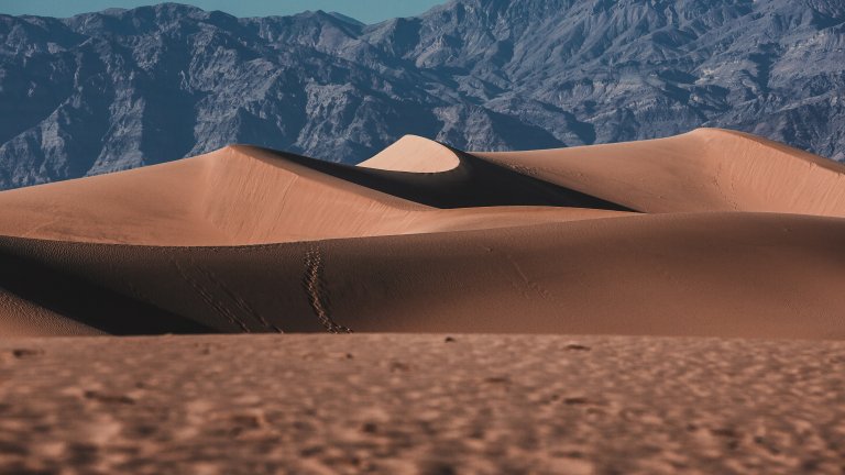 The view of sand dunes in Mesquite Flats, Death Valley National Park.