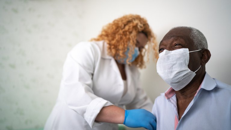 African American gets vaccinated