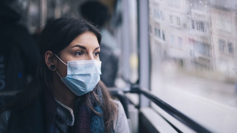Worried woman in face mask.