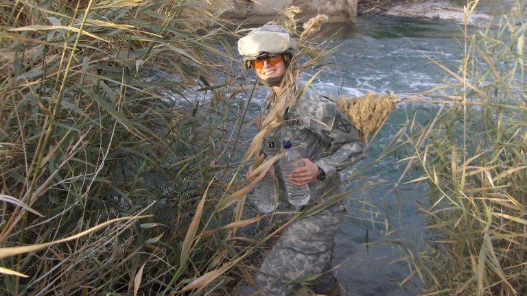 Stanford's Jessica Grembi collects water samples in Iraq.