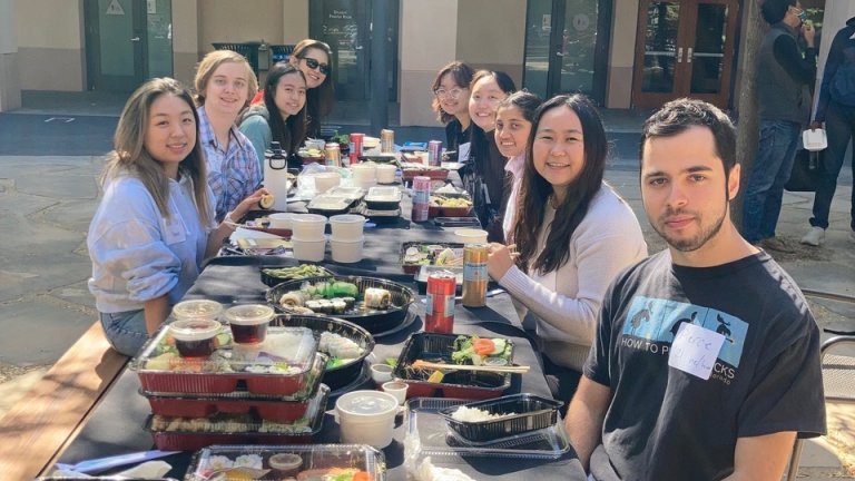 students gathered for a luncheon