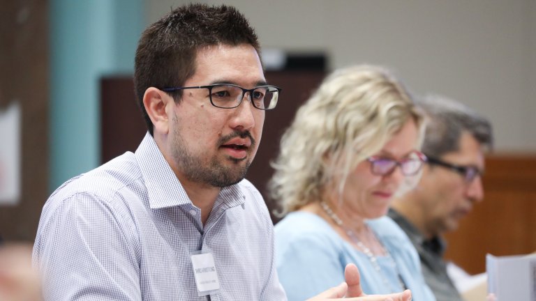 Scholars participating at a roundtable discussion