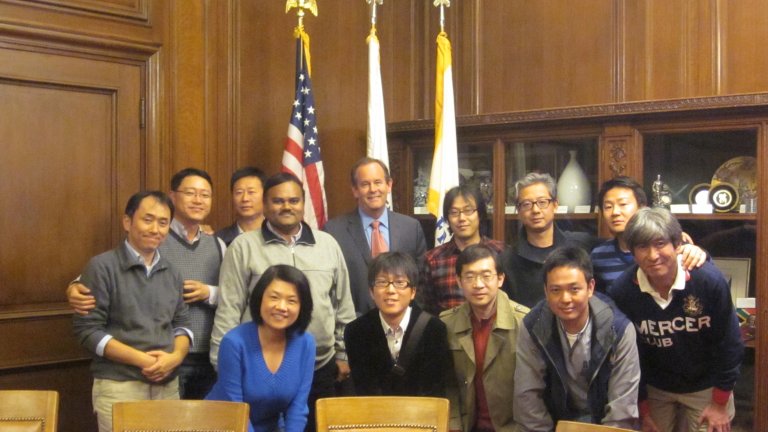 The Corporate Affiliates Visiting Fellows meet with Mark Chandler, the director of the San Francisco Mayor's Office of International Trade in Nov. 2013. sfcityhall corporateaffiliates 2013 original