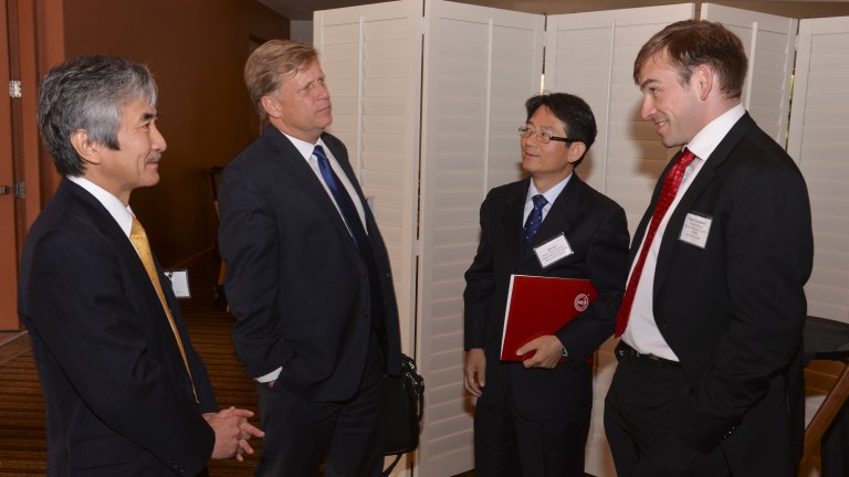 FSI's Michael McFaul and APARC's Khakis Templeman in conversation with two attendees at a reception for Pacific Rim Consuls General and Country Representatives, October 2016.