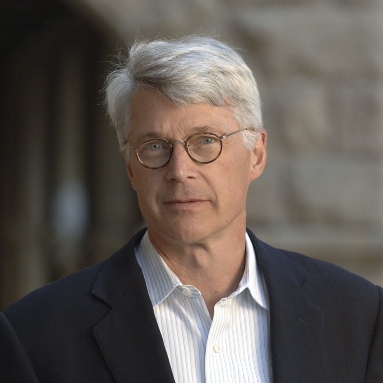 Man with glasses and gray hair