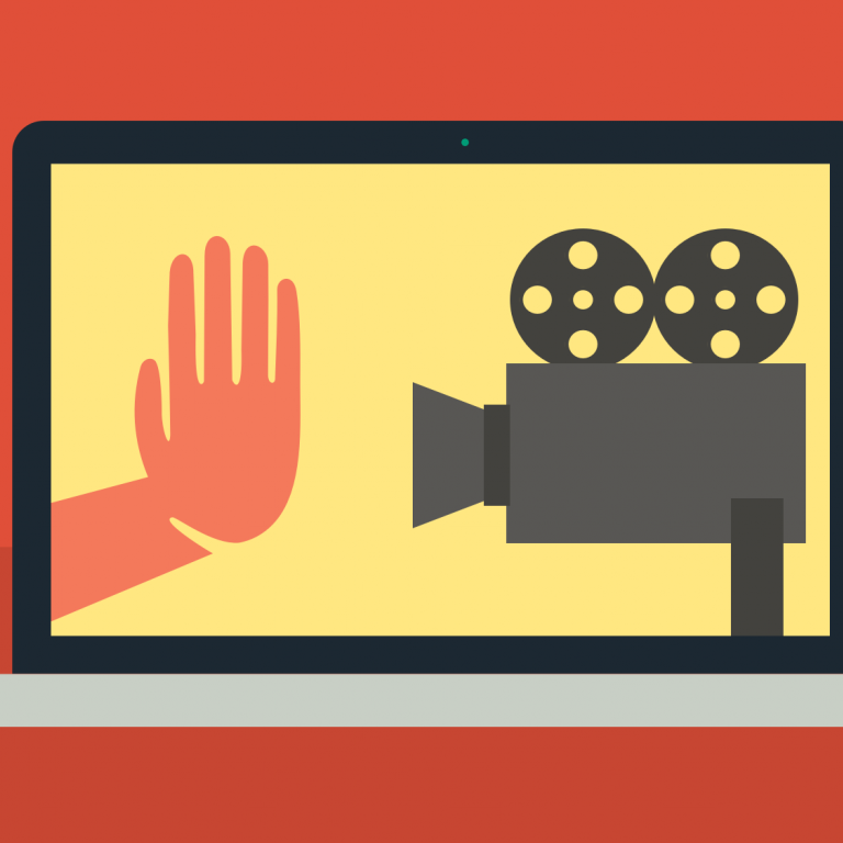 stop hand facing video camera