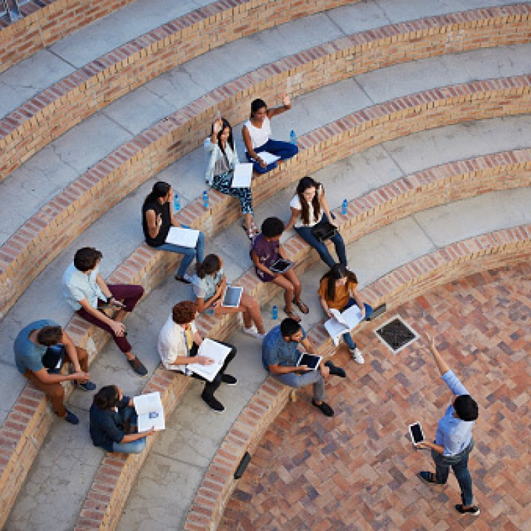 an image of students outside on steps
