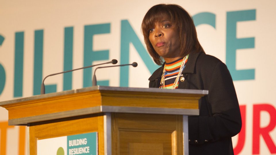 Ertharin Cousin giving a speech at a podium