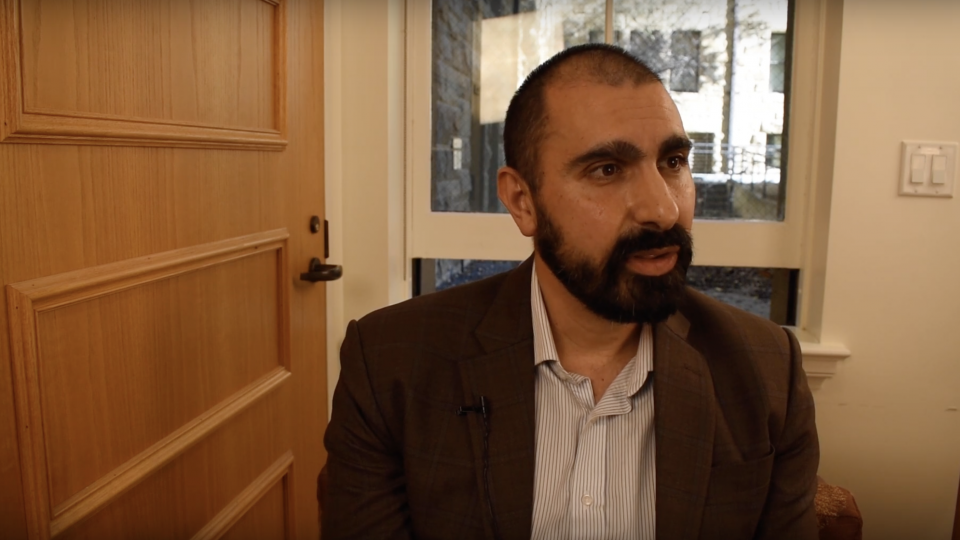 Andray Abrahamian sitting down for an interview at Stanford.