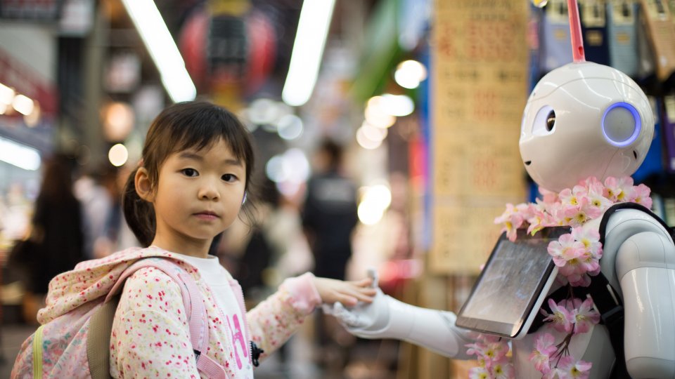 Girl and Robot at the Kuromon Market in Osaka Girl and Robot at the Kuromon Market in Osaka