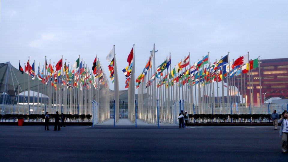 World flags, with China's at the front, at the south entrance of Expo 2010 Shanghai, near the Expo Boulevard, in front of the China pavilion. World flags, with China's at the front, at the south entrance of Expo 2010 Shanghai, near the Expo Boulevard, in front the China pavilion.