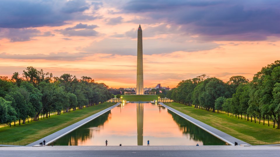 Washington Monument on the Reflecting Pool in Washington, D.C. at dawn. Washington DC, USA