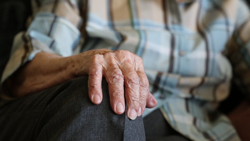 Closeup on a hand of an old man.