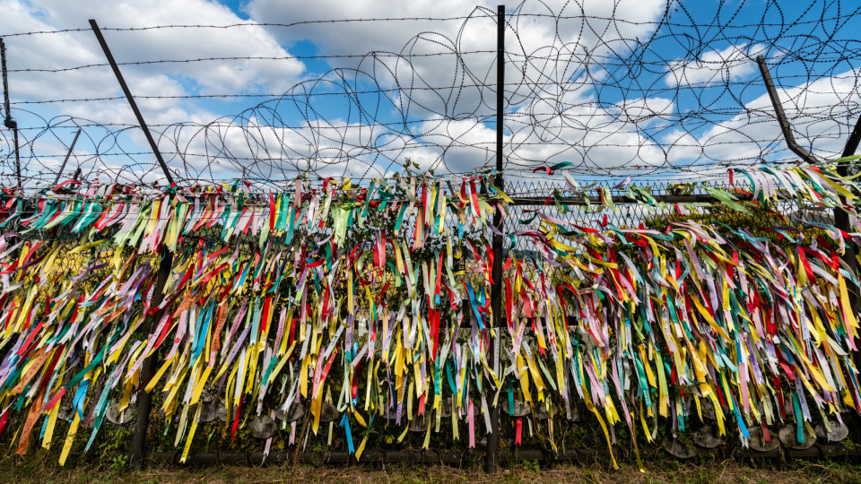 Brightly colored ribbons tied to fences around Imjingak Village in the DMZ on the North Korean Border.