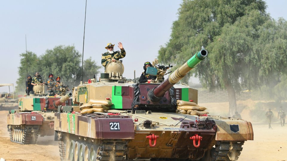 Indian Prime Minister Narendra Modi rides in a tank at Longewala in Jaisalmer, Rajasthan, 14 November 2020.