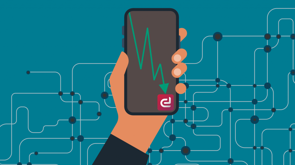 hand holding phone with parler logo