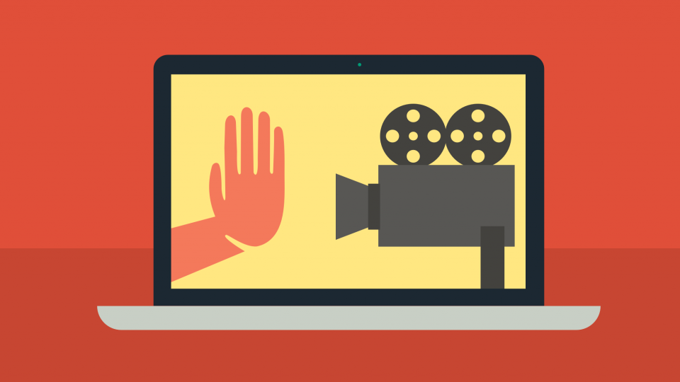 stop hand facing video camera