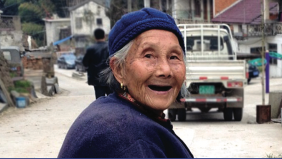 Close up on an old woman in a rural area in China