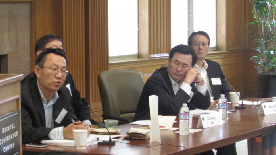 APARC Director and Korea Program Director Gi-Wook Shin with panelists at the 2016 Koret Workshop, speaking to participants.
