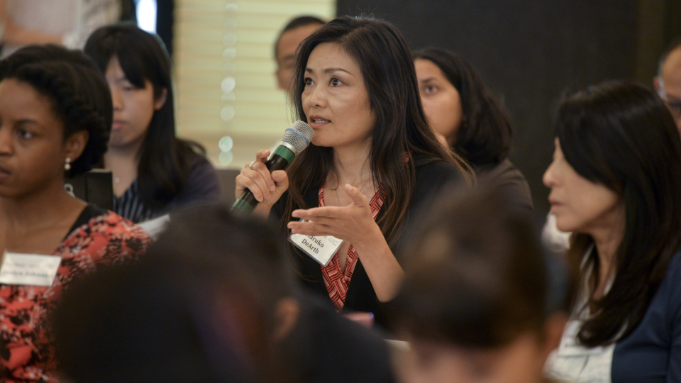 Female attendees during a discussion at a Japan Program conference on gender equity