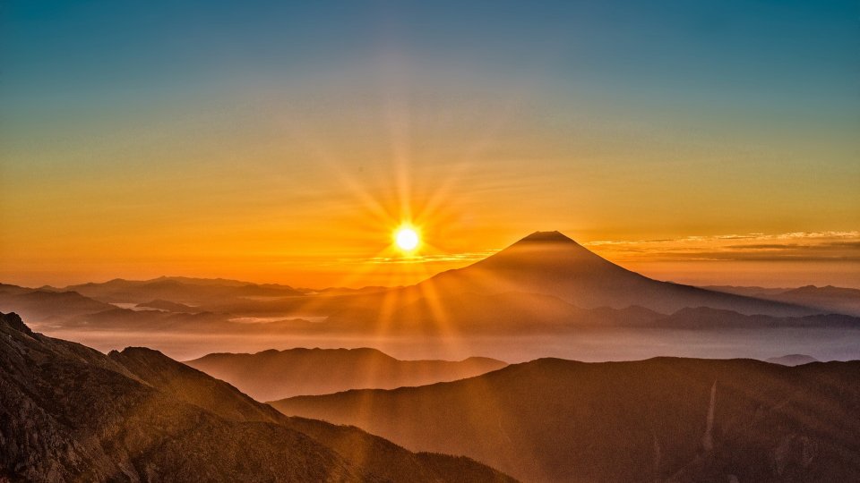 Rising sun over Mount Fuji