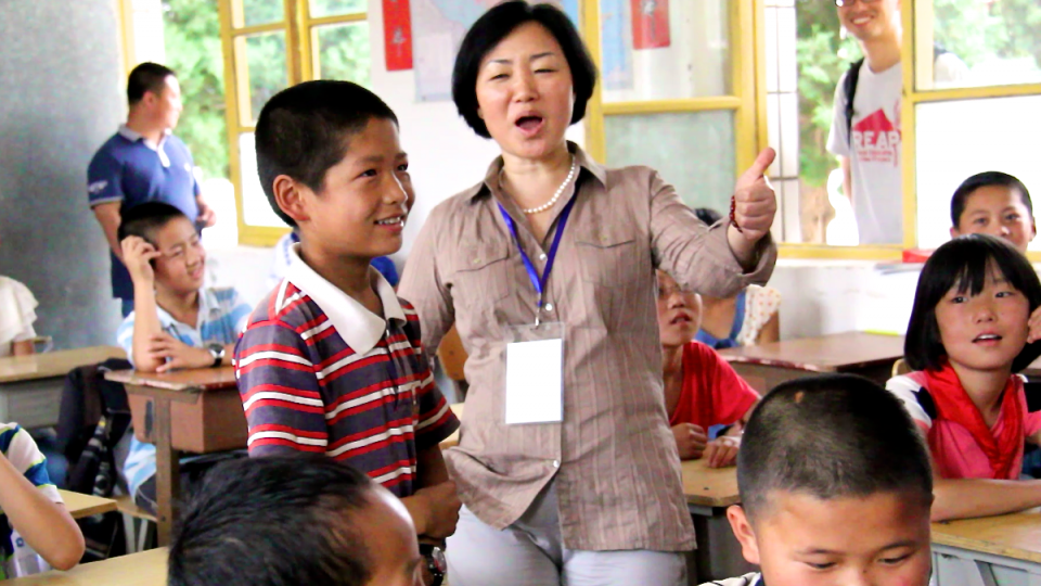 REAP Happy teacher
