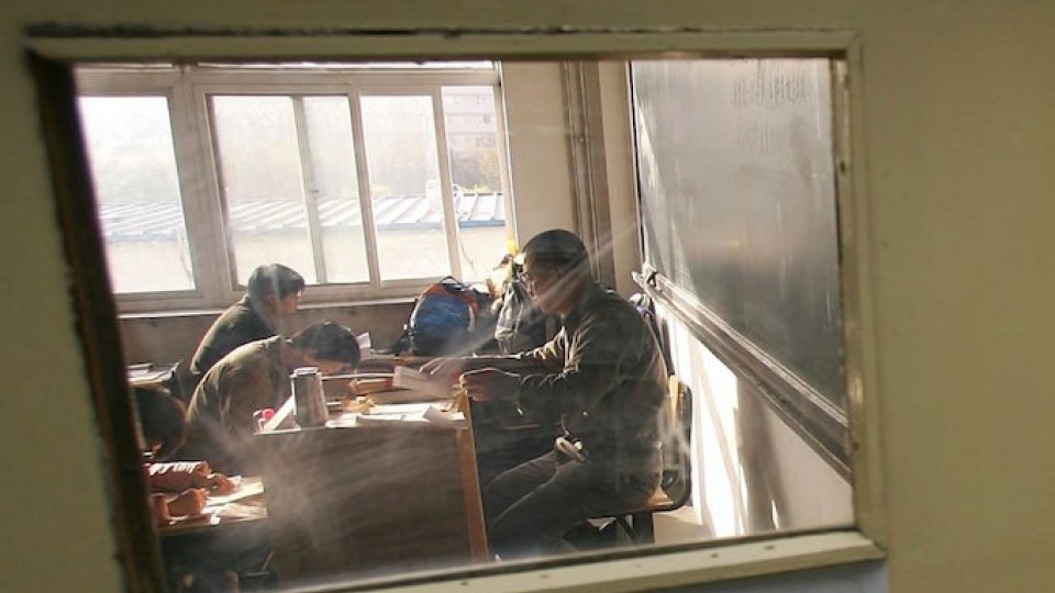 Children in China study in a classroom
