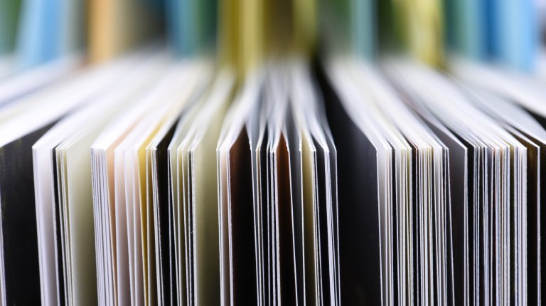 Closeup of the edge of open book pages. Closeup of the edge of open book pages.