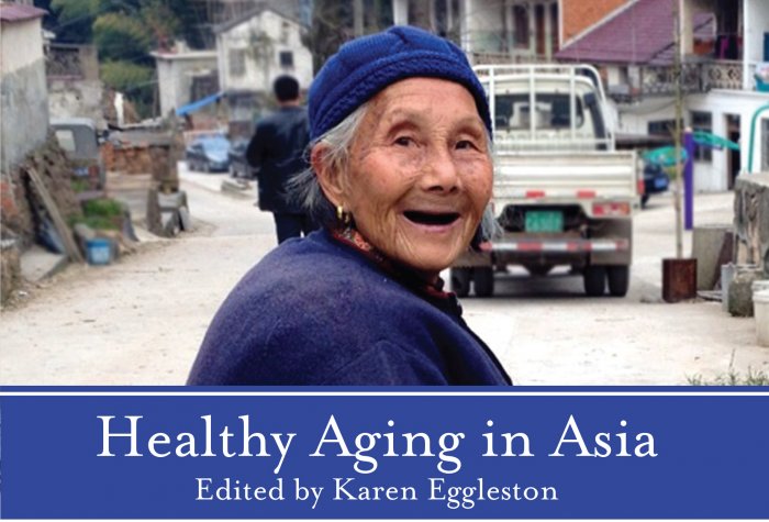 Cover image of the book "Healthy Aging in Asia", showing a smiling elderly Chinese woman with a cane standing in a small village.