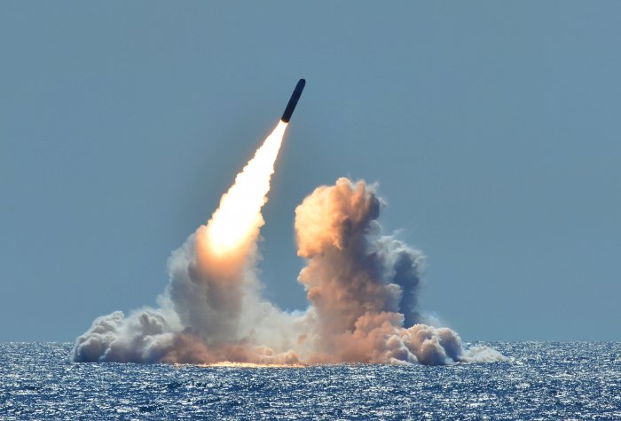 rocket launched over the ocean