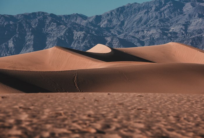 The view of sand dunes in Mesquite Flats, Death Valley National Park.