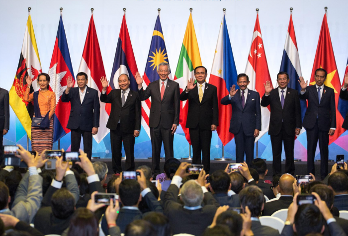 Leaders from the ASEAN league gather onstage at the 33rd ASEAN Summit in 2018 in Singapore.
