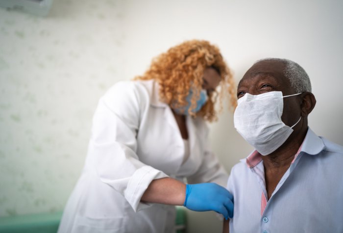 African American gets vaccinated