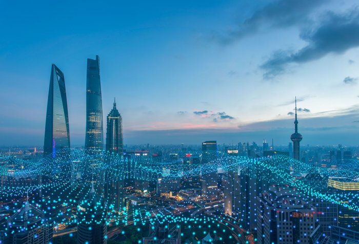 Data graph lines over cityscape in China.