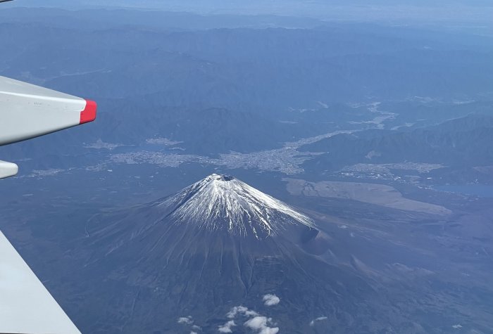 view of a mountain from an airplane