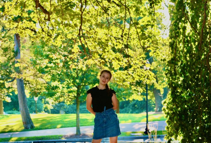 Kristine Pashin at the Farnam Memorial Gardens in New Haven, CT high school girl standing amidst park greenery