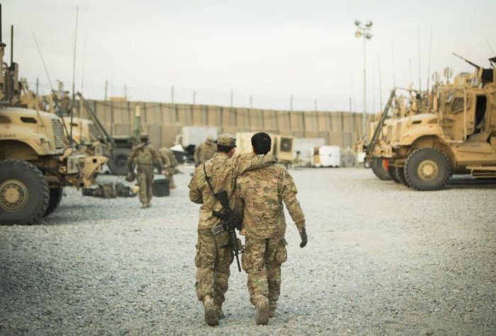Two soldiers walking away