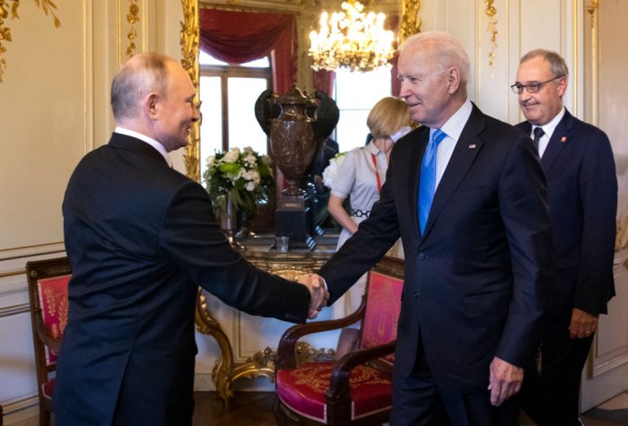 Joe Biden and Vladimir Putin shaking hands