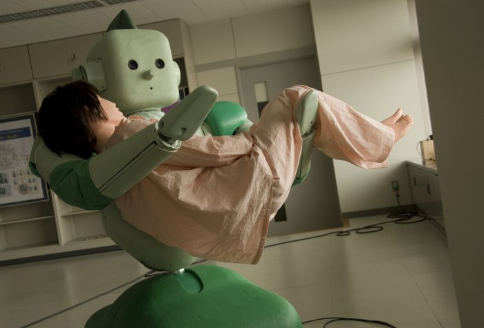 A Japanese robot prototype lifts a dummy patient