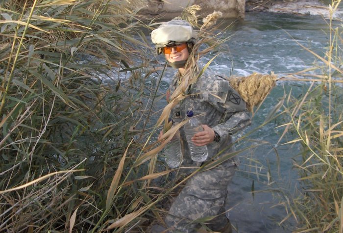 Stanford's Jessica Grembi collects water samples in Iraq.