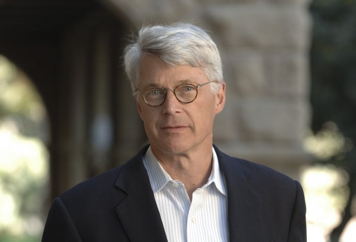 Man with glasses and gray hair