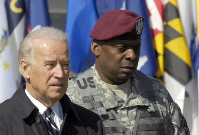 Joe Biden and Lt. Gen. Lloyd J. Austin III attend a ceremony welcoming troops home at Fort Bragg in North Carolina on April 8, 2009.
