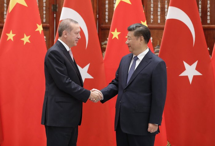 Chinese President Xi Jinping shakes hands with Turkish President Recep Tayyip Erdogan before their meeting on Sept. 3, 2016 in Hangzhou, China.