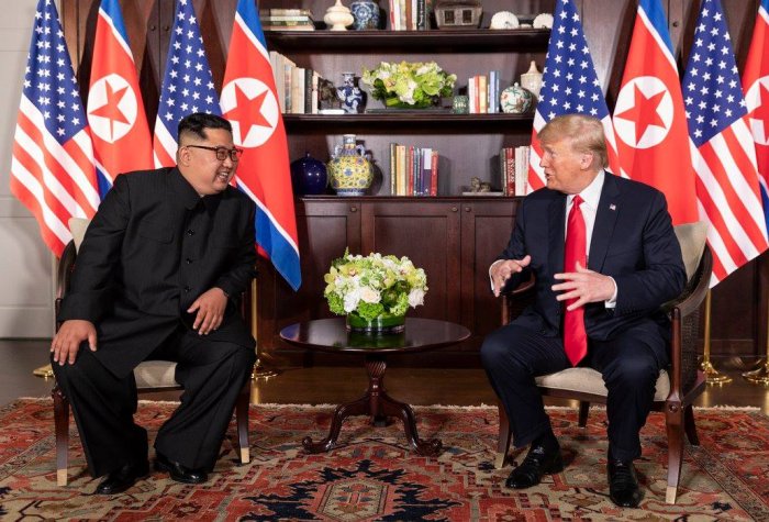 President Trump and Chairman Ki talking during Sinapore Summit