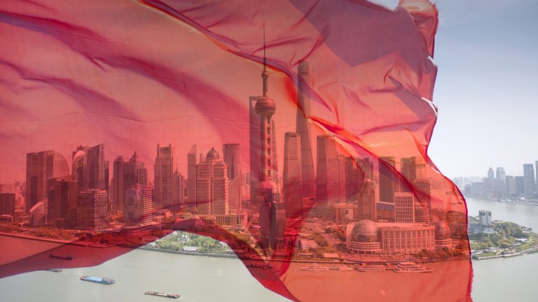View of Pudong business district with a transparent Chinese flag superimposed.
