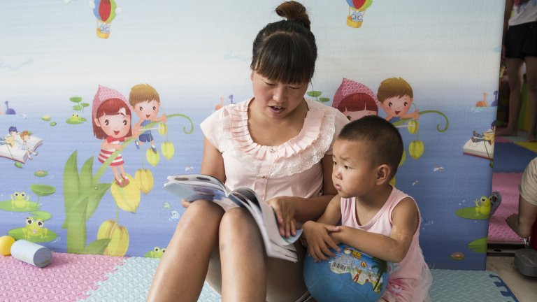 reading a book with baby